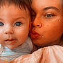 Ana participe au concours pour gagner de l'argent avec cette photo : baby, blanket, blue_eyes, cheek, child, closeup, clothing, cuddle, drool, expression, face, hair, head, indoor, intimate, kiss, person, portrait, skin, warm_filter