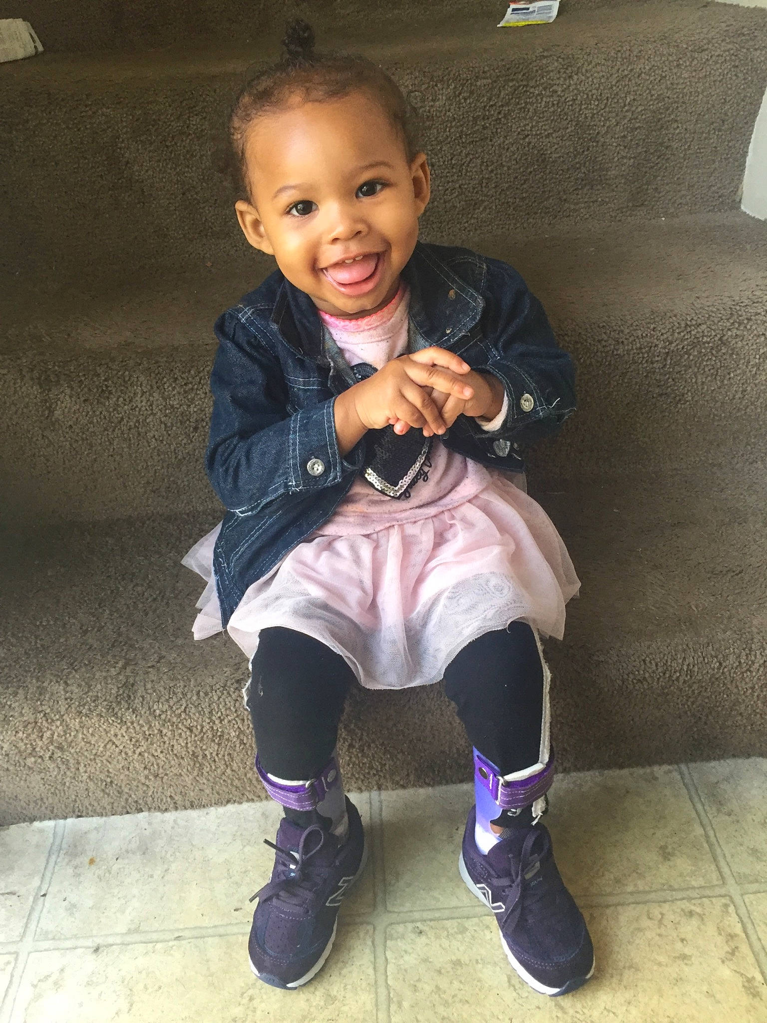 Kamara joined the competition — help win amazing prizes! cheek, child, child_model, cool, footwear, fun, happy, joy, leg, outerwear, person, shoe, sitting, smile, standing, t_shirt, toddler