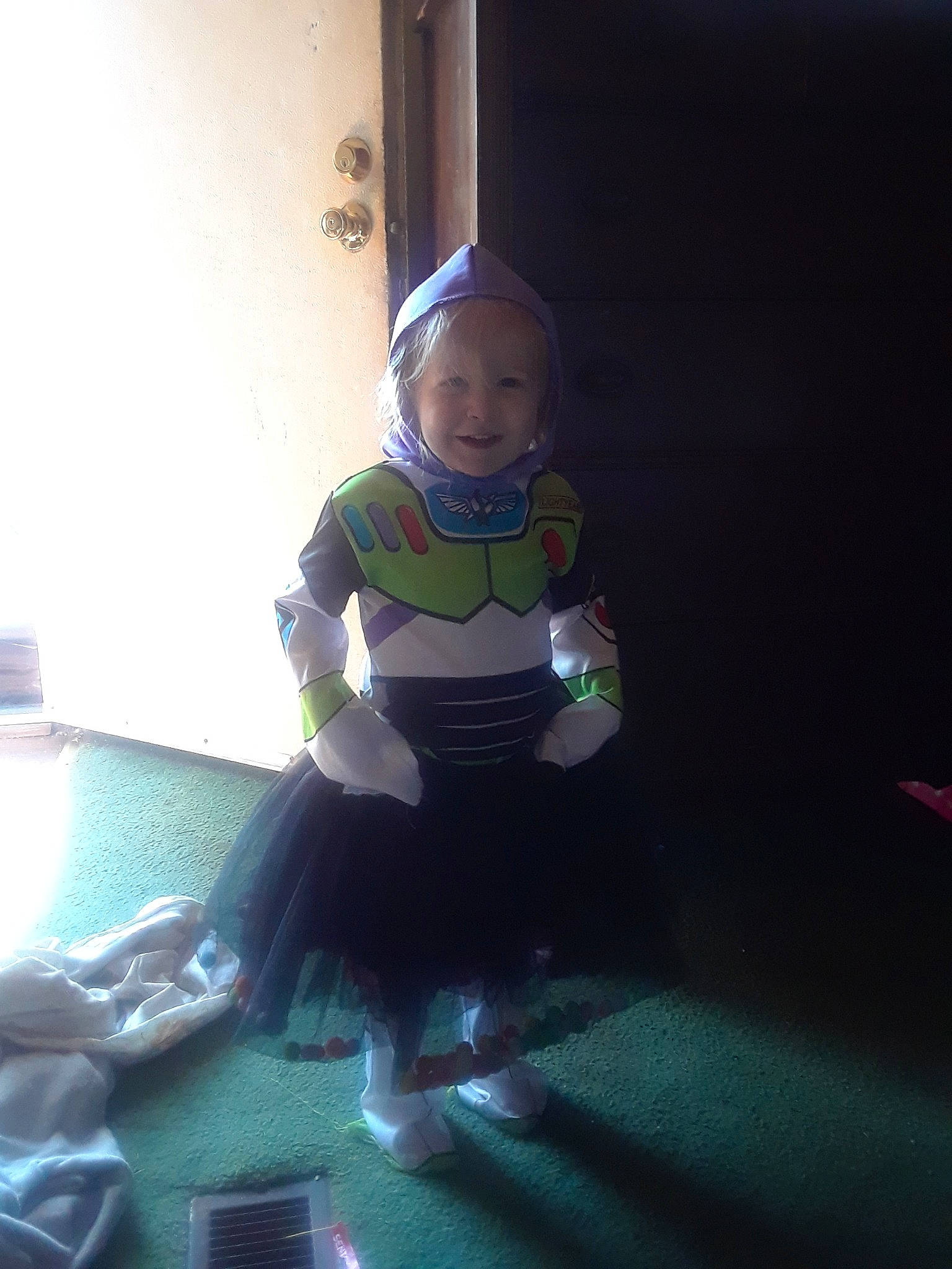 Timothy is registered to the contest to win money with this photo: child, fun, headwear, joy, leisure, person, photography, recreation, smile, toddler, vacation, wetsuit