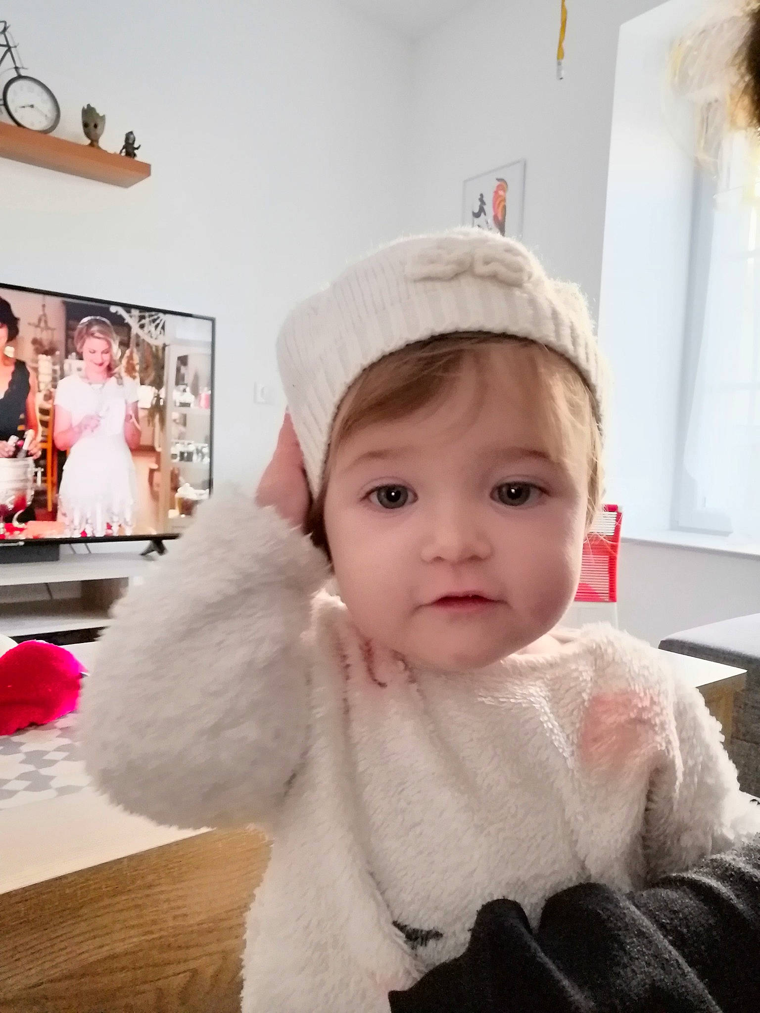 Anthéa a rejoint le concours — aidez-le/la à gagner de superbes lots ! baby, cap, cheek, child, clothing, ear, fashion_accessory, fur, fur_clothing, head, headgear, joy, outerwear, person, pink, skin, smile, textile, toddler, white