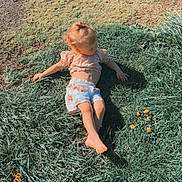 Coralyn joined the competition — help win amazing prizes! barefoot, car, casual_clothing, child, cute, daytime, flower, grass, greenery, nature, outdoor, person, playing, relaxing, shadow, shorts, summer, sunlight, toddler, wheel
