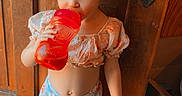 Coralyn is registered to the contest to win money with this photo: barefoot, box, casual_clothing, child, cute, date_stamp, door_handle, drink, floral_clothing, indoor, light, person, pony_tail, red_sippy_cup, standing, toddler, vintage_filter, wooden_door, wooden_floor, young_child