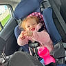 Coralyn is registered to the contest to win money with this photo: car_door, car_interior, car_seat, casual_clothing, child, cute, daylight, happy, headrest, pink_jacket, safety_harness, seat, seatbelt, sippy_cup, smiling, toddler, travel, vehicle, window, young_child