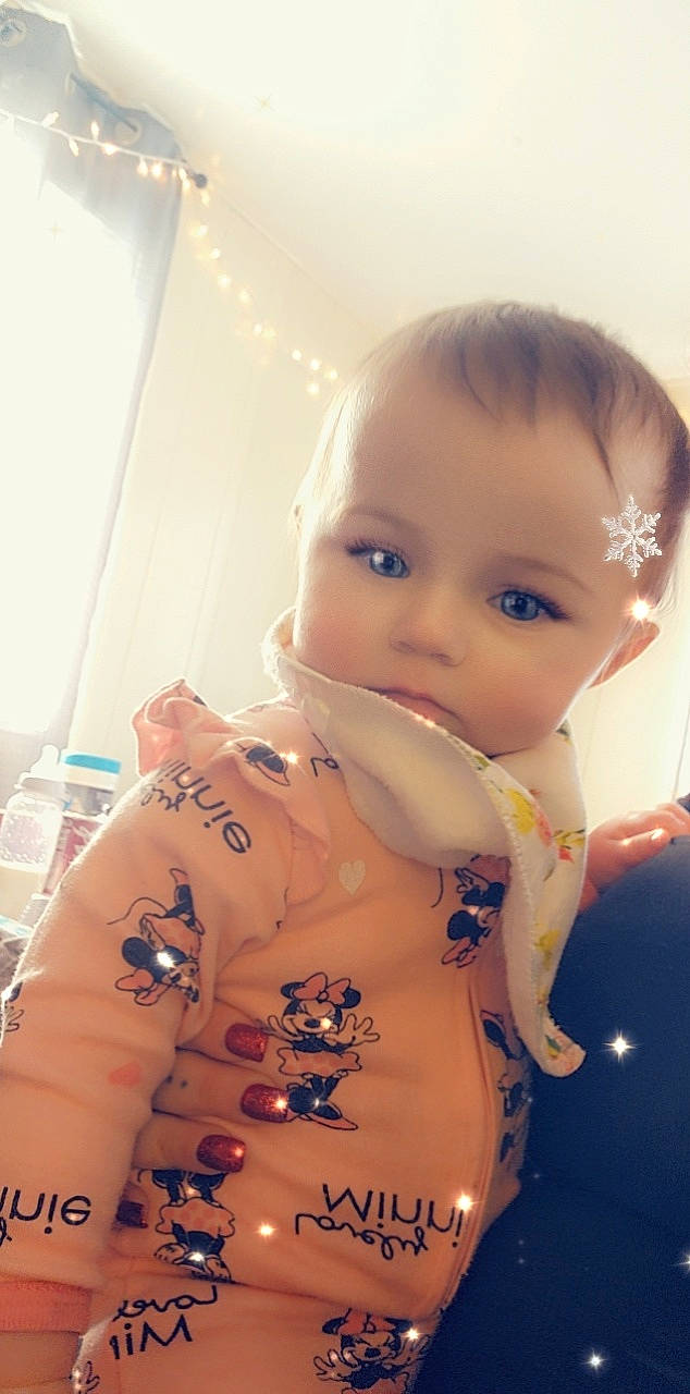 Kelly is registered to the contest to win money with this photo: abdomen, art, baby, baby_toddler_clothing, cheek, chest, child, fun, happy, head, mouth, nose, person, sitting, skin, sleeve, toddler, uniform