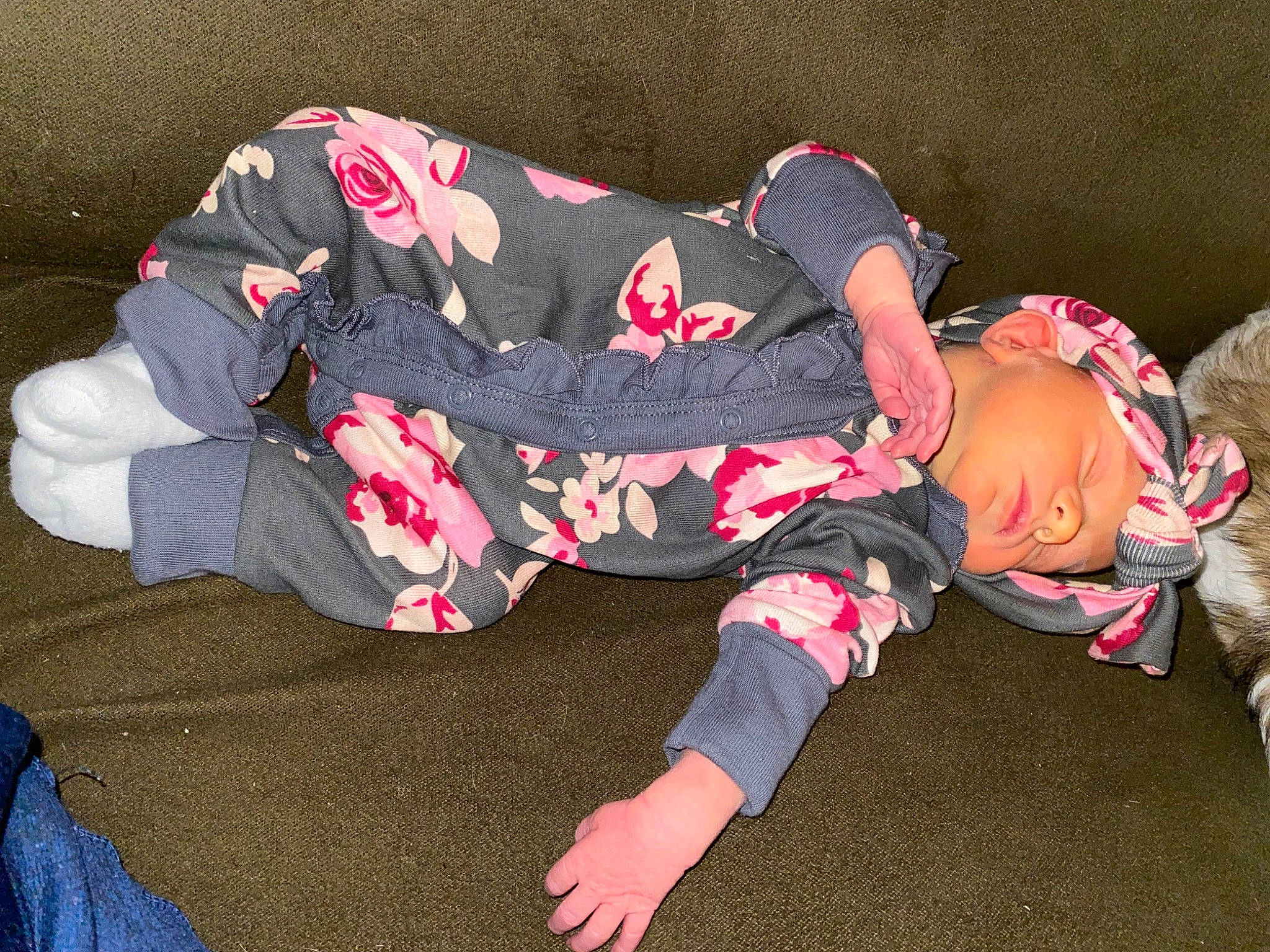 Kayleigh is registered to the contest to win money with this photo: baby, baby_products, baby_toddler_clothing, carmine, child, comfort, foot, headwear, human_leg, knee, lap, linens, nap, pattern, person, sitting, sleeve, sock, thigh, toddler