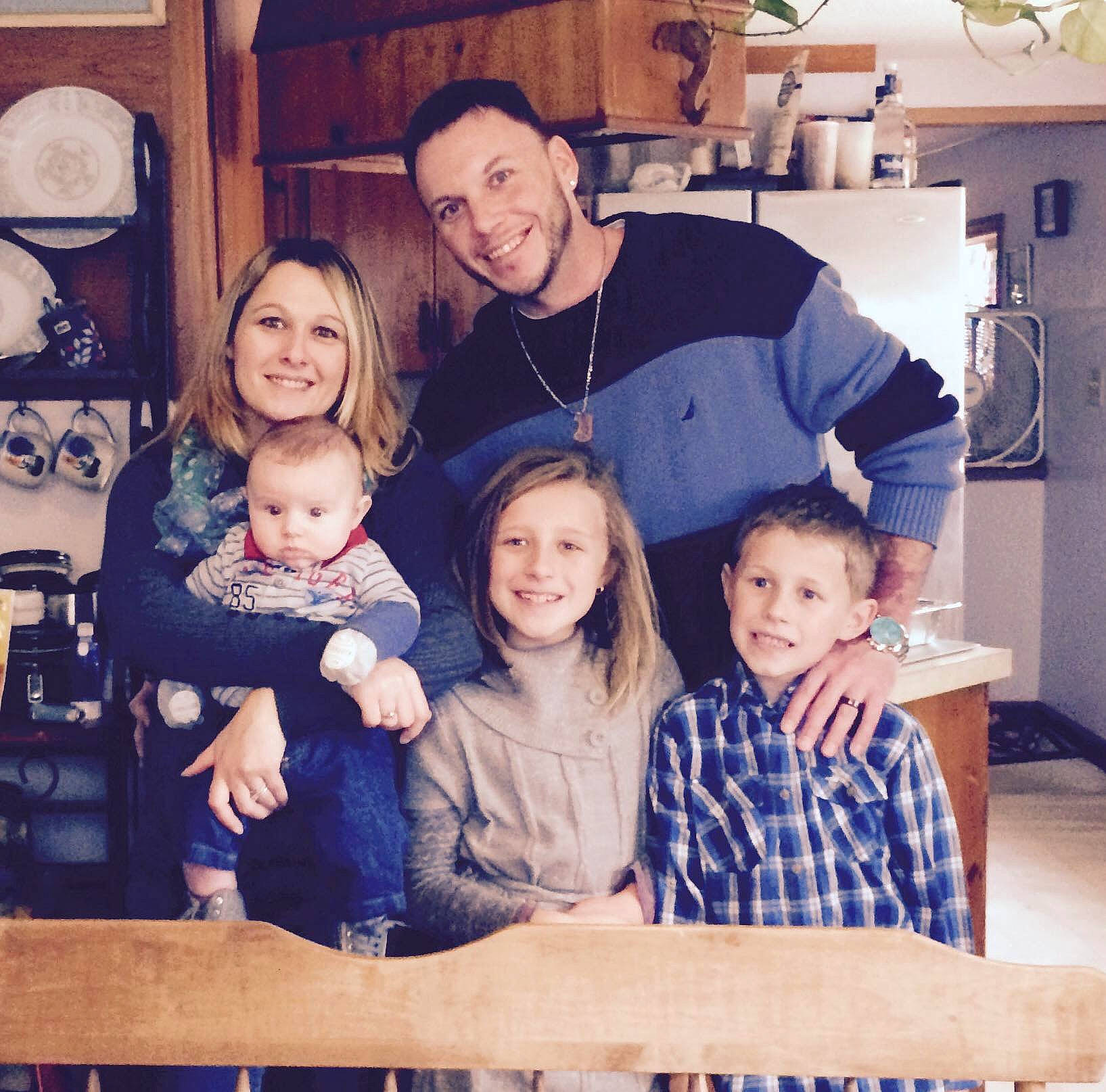 Kadence joined the competition — help win amazing prizes! arm, baby, child, cool, event, family_taking_photos_together, fashion, fun, happy, interaction, iris, joy, lap, people, person, sleeve, smile, social_group, standing, t_shirt