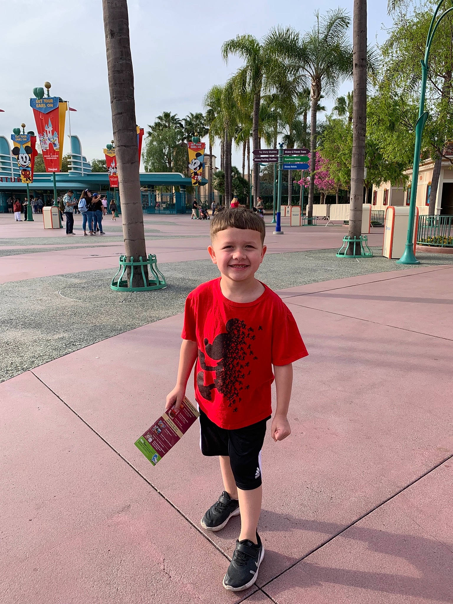 Robbie is registered to the contest to win money with this photo: child, footwear, fun, happy, joy, leisure, male, park, person, recreation, running, shoe, shorts, smile, snapshot, summer, t_shirt, toddler, tourism, tree