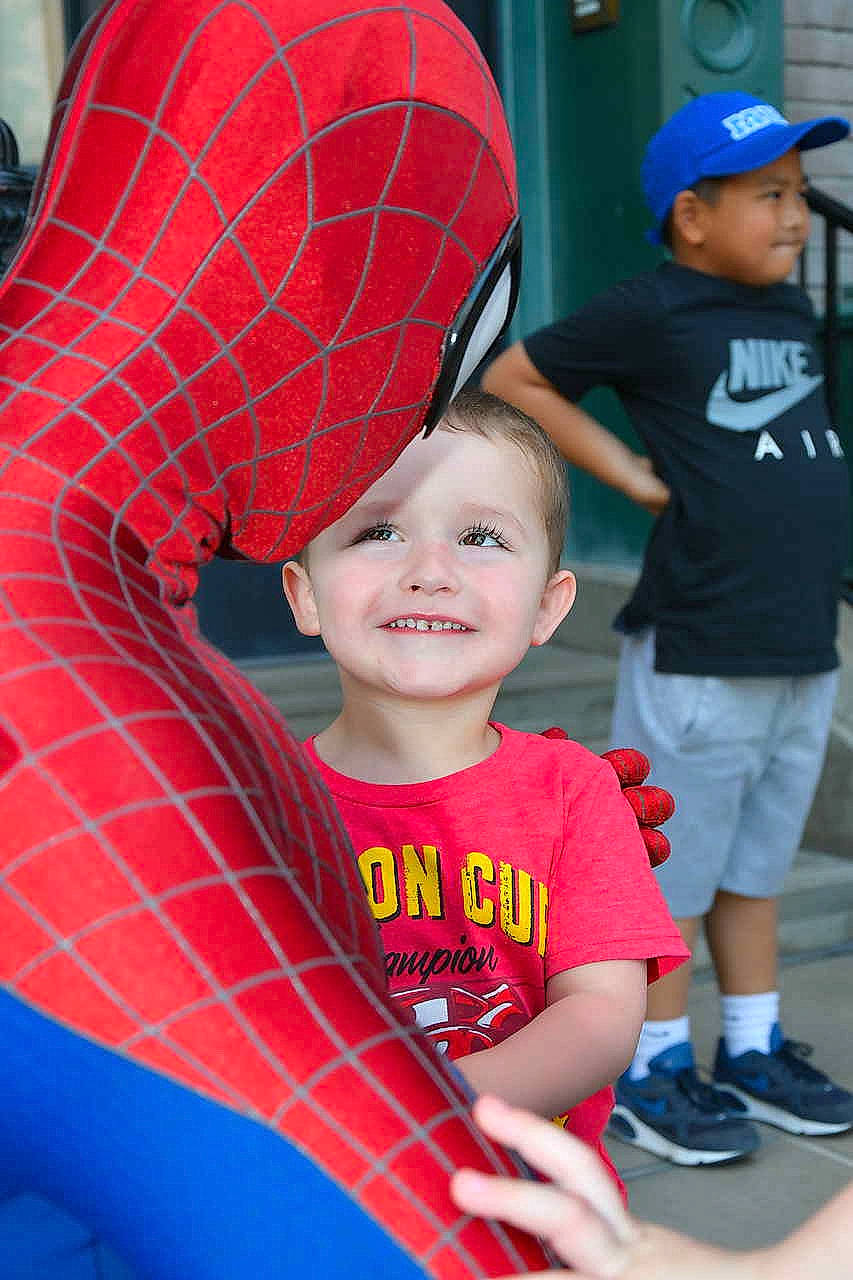 Isaac is registered to the contest to win money with this photo: baseball, cap, child, fun, headwear, joy, leisure, person, play, red, toddler, world