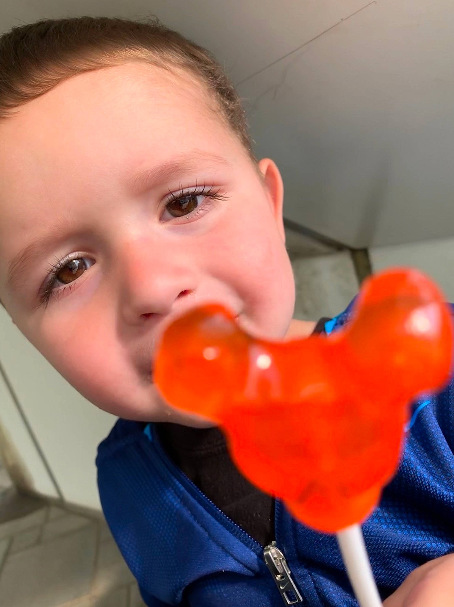 Isaac is registered to the contest to win money with this photo: balloon, child, nose, orange, person, toddler
