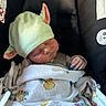 baby, sleeping, car_seat, blanket, hat, cute, child, infant, cozy, soft, peaceful, newborn, bundle, clothing, resting, adorable, indoor, portrait, headwear, seatbelt