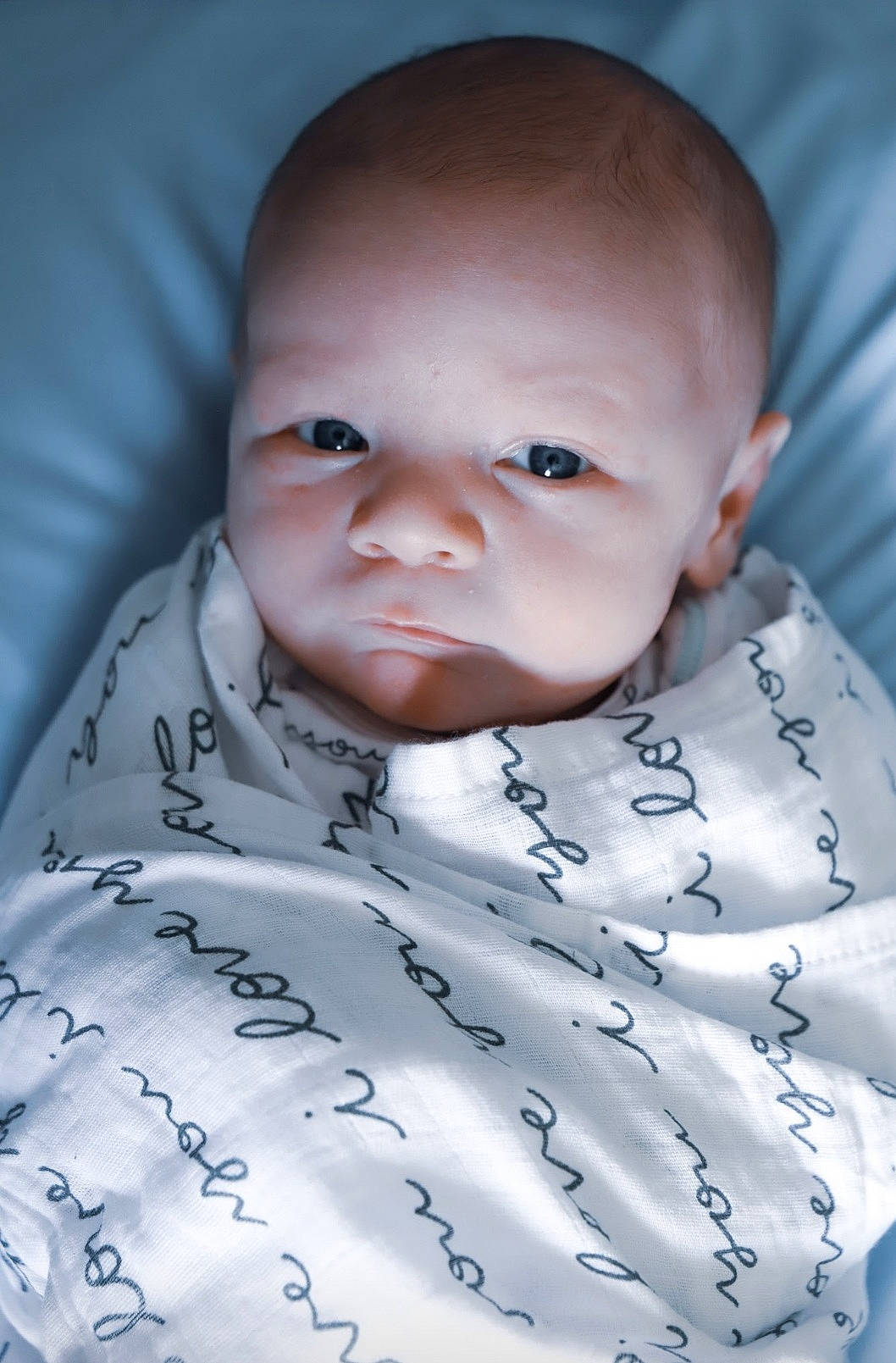 Wesley is registered to the contest to win money with this photo: baby, baby_toddler_clothing, carmine, cheek, child, chin, collar, comfort, flash_photography, happy, iris, linens, neck, pattern, person, portrait_photography, sleeve, toddler