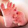 Aria participe au concours pour gagner de l'argent avec cette photo : baby, feet, toes, close_up, skin, infant, soft, tiny, curling, creases, newborn, human, foot, pink, child, barefoot, detail, macro, warm_light, background_blur