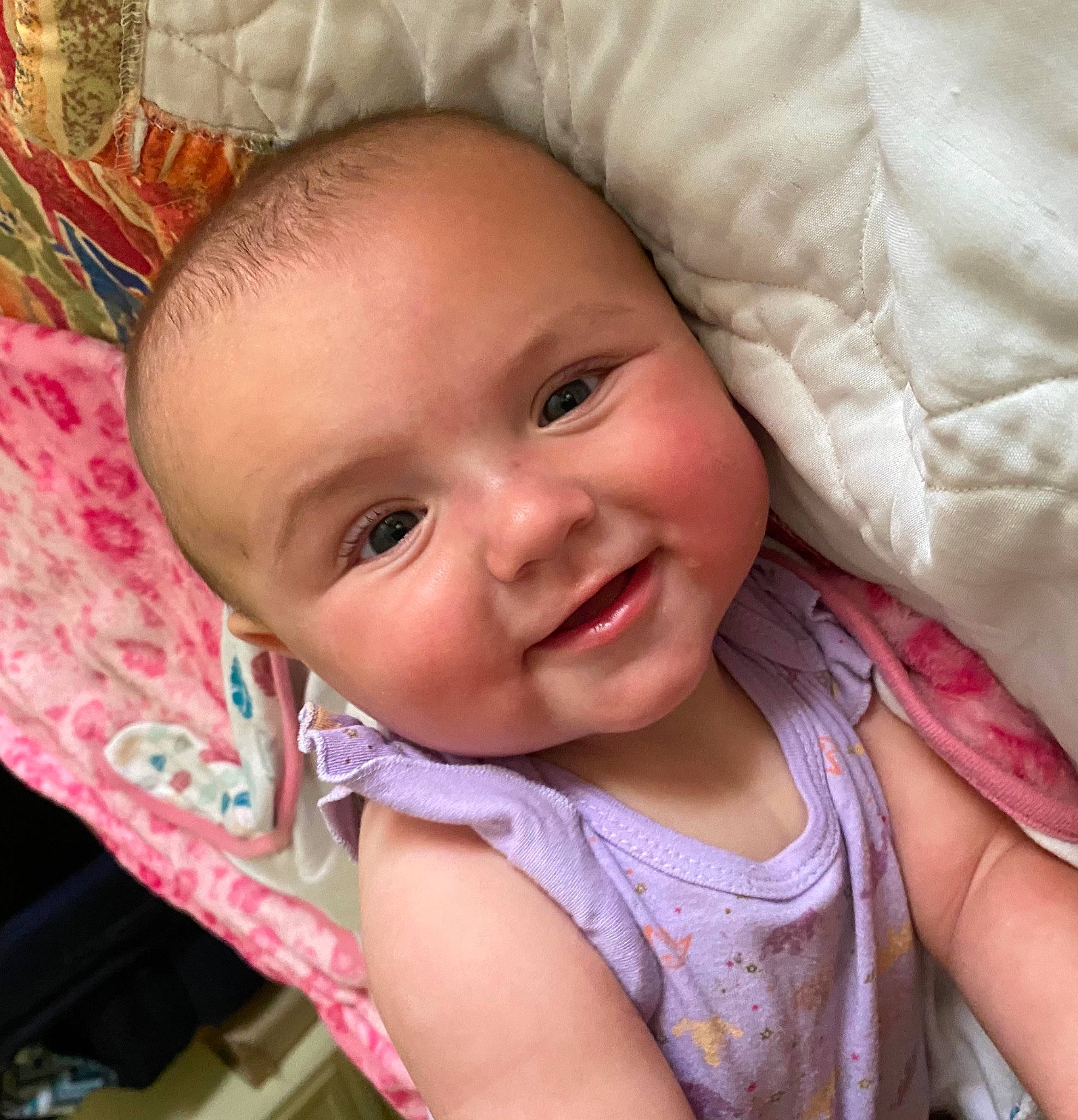 Keira is registered to the contest to win money with this photo: baby, baby_toddler_clothing, cheek, chin, ear, eye, eyebrow, eyelash, happy, head, headgear, iris, joy, lip, mouth, nose, person, pink, skin, smile