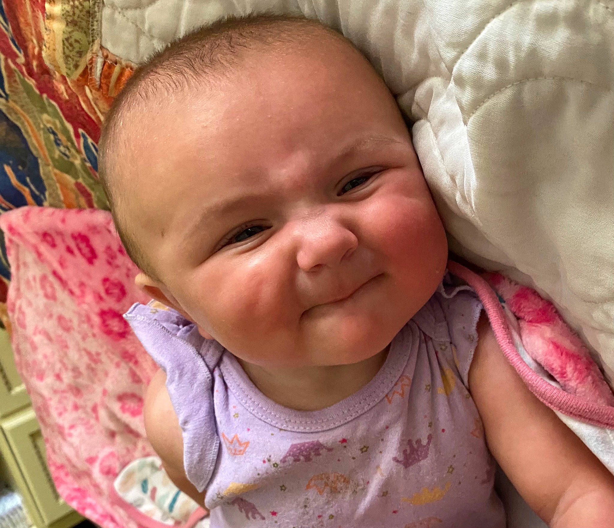 Keira is registered to the contest to win money with this photo: baby, baby_toddler_clothing, cheek, ear, eye, eyelash, face, happy, head, iris, joy, lip, mouth, nose, person, pink, product, skin, sleeve, smile