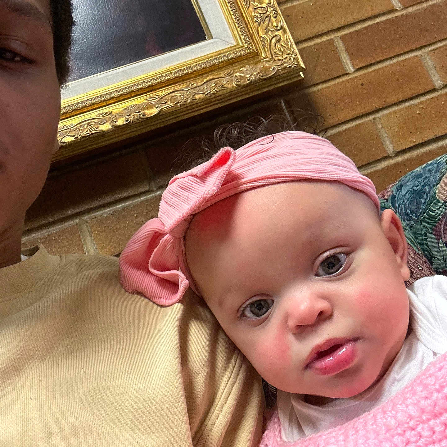 Aiyanna joined the competition — help win amazing prizes! accessories, baby, bonnet, brick, cap, clothing, coat, couch, earring, face, furniture, hat, head, jacket, jewelry, person, photography, portrait, selfie, t_shirt