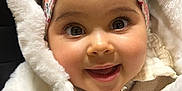 Ambre participe au concours pour gagner de l'argent avec cette photo : baby, child, smile, face, headband, floral, coat, white, fur, cute, happy, eyes, portrait, warm, clothing, infant, closeup, adorable, expressive, person