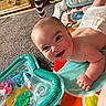 Julius joined the competition — help win amazing prizes! baby, infant, smiling, play_mat, toy, indoor, carpet, diaper, child, cute, face, head, skin, arm, hand, colorful, happy, young_child, floor, playtime