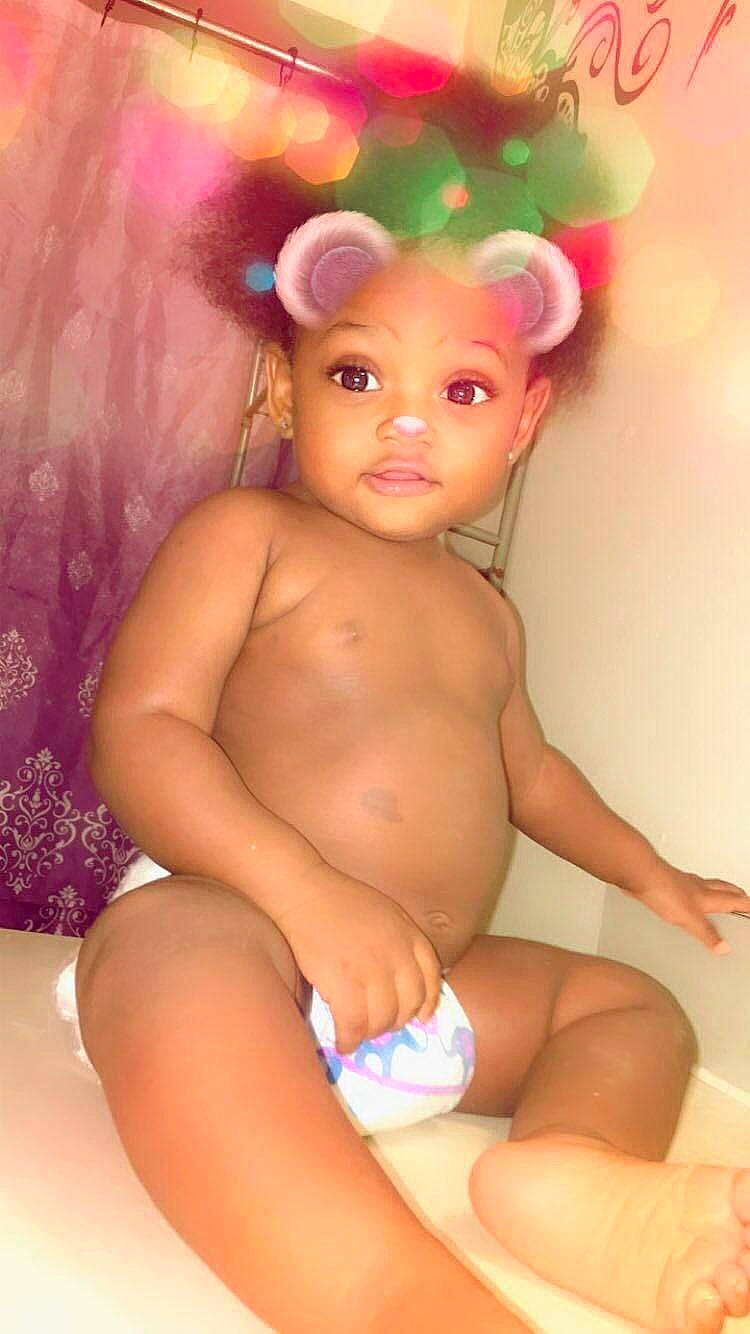 Christian is registered to the contest to win money with this photo: baby, child, fictional_character, person, pink, stomach, toddler