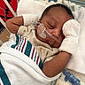 Hezekiah joined the competition — help win amazing prizes! newborn, baby, infant, child, hospital, bassinet, blanket, swaddle, mittens, medical_tubing, nasal_cannula, bed, sleeping, awake, portrait, face, hands, striped_blanket, cozy, healthcare