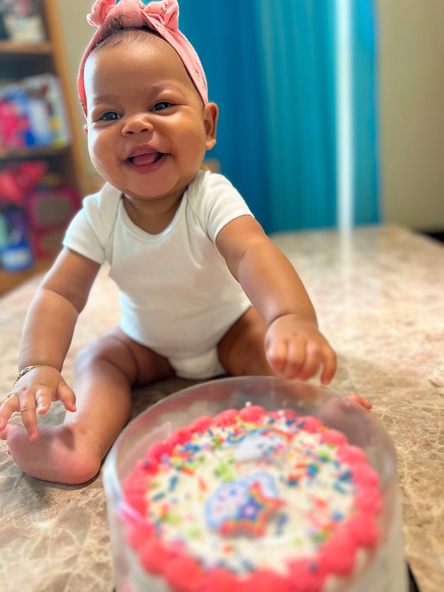 Harmony is registered to the contest to win money with this photo: baby, baby_laughing, baby_playing_with_toys, baby_toddler_clothing, baked_goods, baking, cap, child, event, face, fun, happy, headgear, icing, leisure, person, play, skin, smile, sweetness