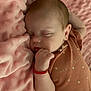 Arianna participe au concours pour gagner de l'argent avec cette photo : baby, sleeping, blanket, pink, infant, soft, cute, polka_dot, bracelet, child, face, peaceful, rest, closeup, skin, hand, cozy, portrait, indoors, newborn