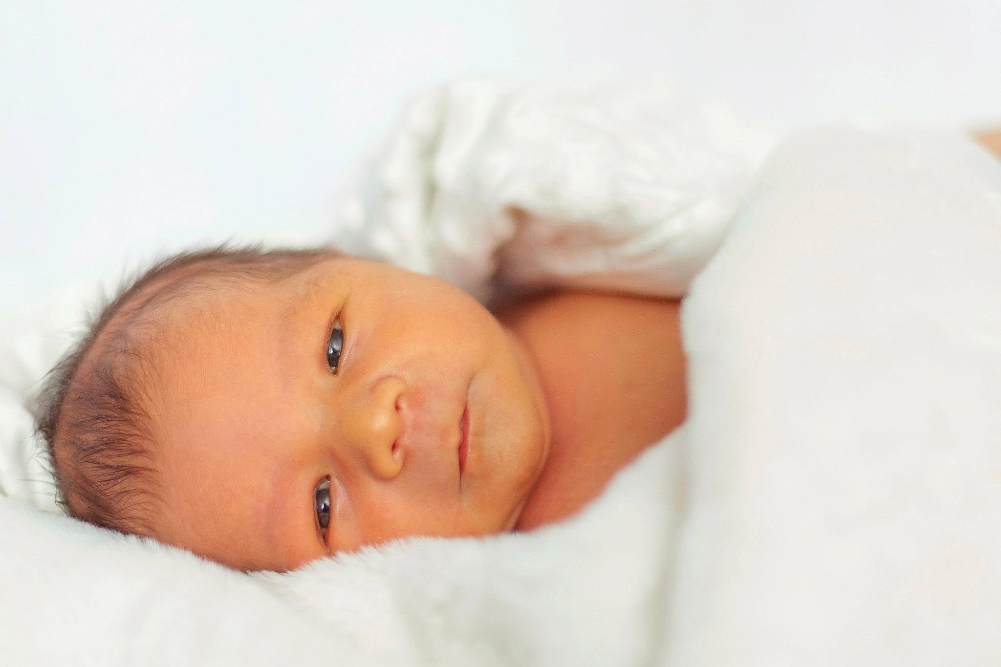 Hayes is registered to the contest to win money with this photo: baby, baby_products, baby_sleeping, baby_toddler_clothing, bedding, bedtime, cheek, child, comfort, eyelash, face, fur, iris, linens, lip, person, portrait_photography, room, skin, toddler