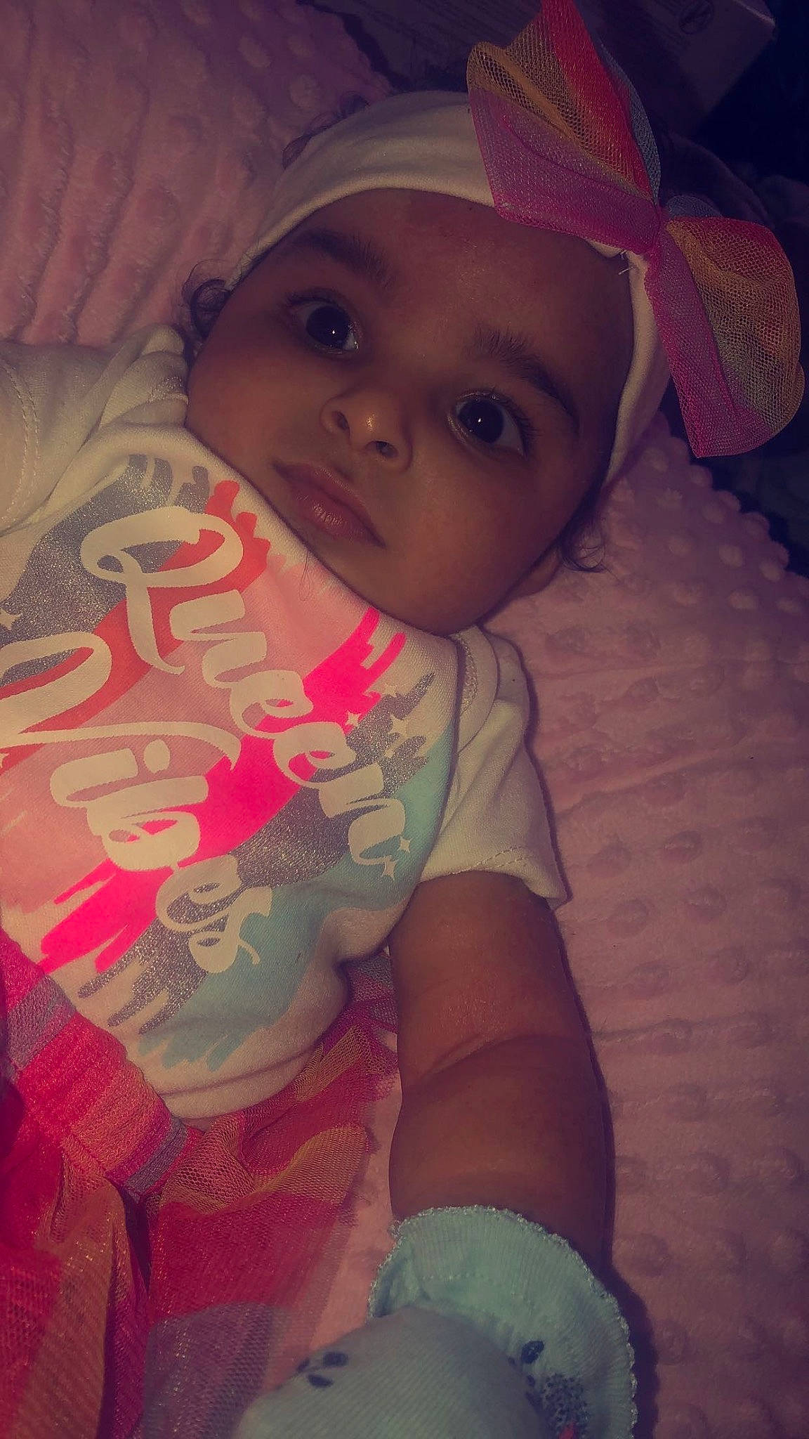 Leah is registered to the contest to win money with this photo: baby, cheek, comfort, cool, eyebrow, finger, forehead, happy, headwear, human, human_body, iris, lip, mouth, nose, person, pink, skin, sleeve, t_shirt