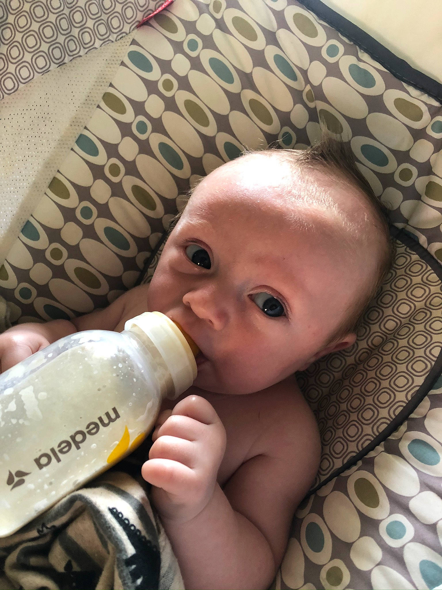 Landon joined the competition — help win amazing prizes! baby, baby_bottle, baby_bottle_feeding, bottle, cheek, drinkware, ear, eye, eyebrow, eyelash, face, finger, head, infant_formula, milk, nail, nose, person, plastic_bottle, skin