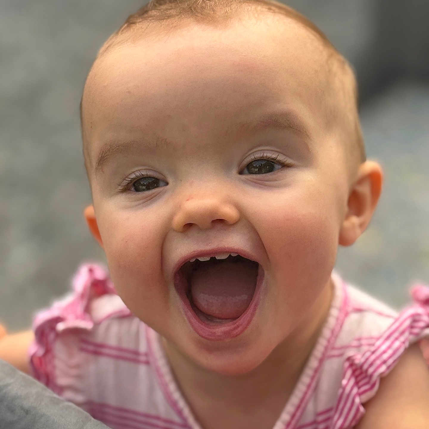 Wrenley joined the competition — help win amazing prizes! baby, child, smiling, happy, face, mouth_open, eyes, pink_clothing, striped, infant, closeup, portrait, cute, cheerful, skin, hand, soft_focus, outdoor, expression, young