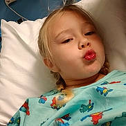 Sandra is registered to the contest to win money with this photo: architecture, baby, bed, blanket, bodypart, building, clinic, cosmetics, cushion, face, finger, furniture, hand, head, homedecor, hospital, lipstick, operatingtheatre, patient, person