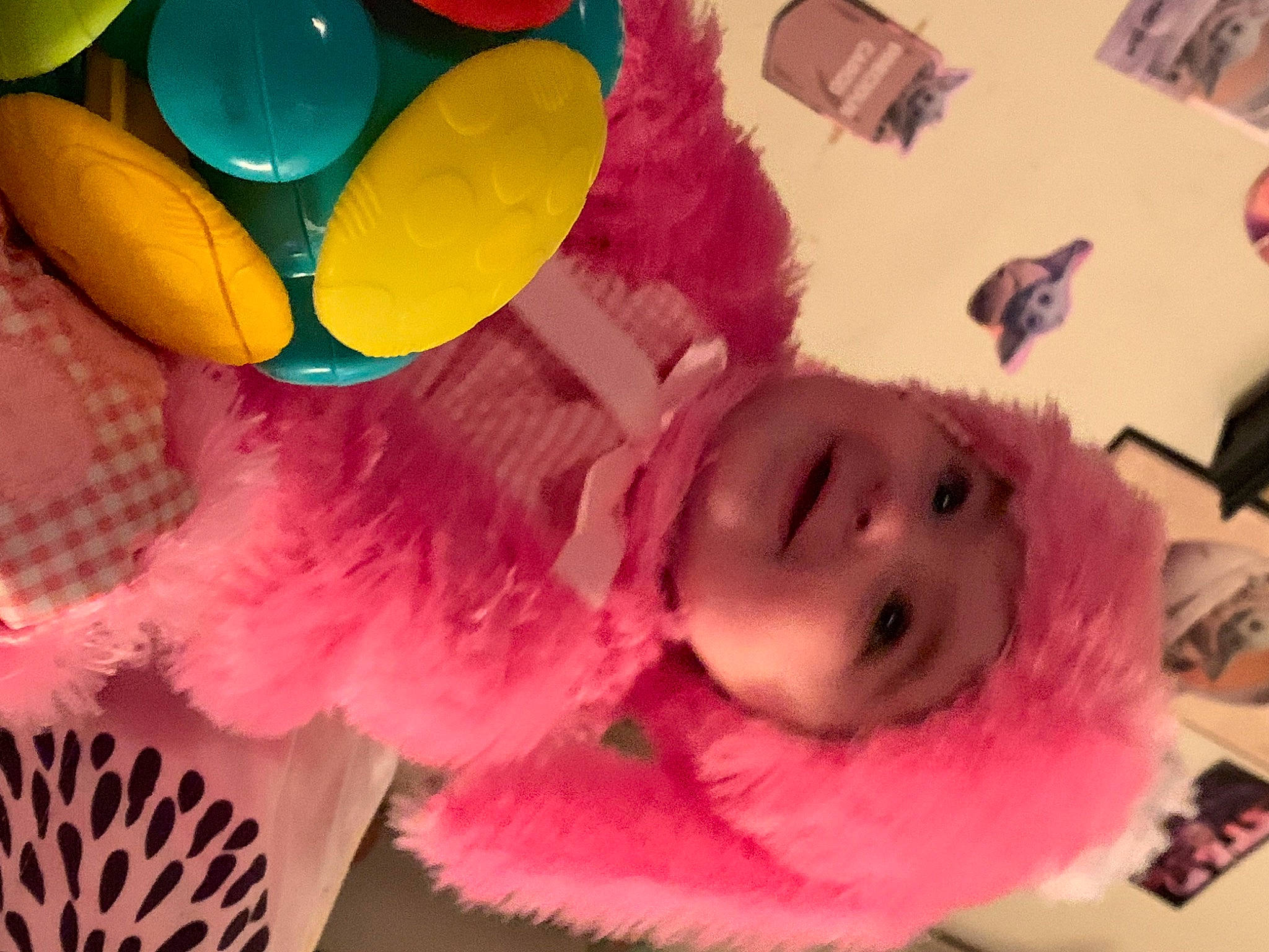 Rosalyn is registered to the contest to win money with this photo: art, baby, baby_toys, costume, eyelash, fun, fur, happy, headgear, headwear, magenta, party_supply, person, pink, plush, room, smile, stuffed_toy, textile, toddler