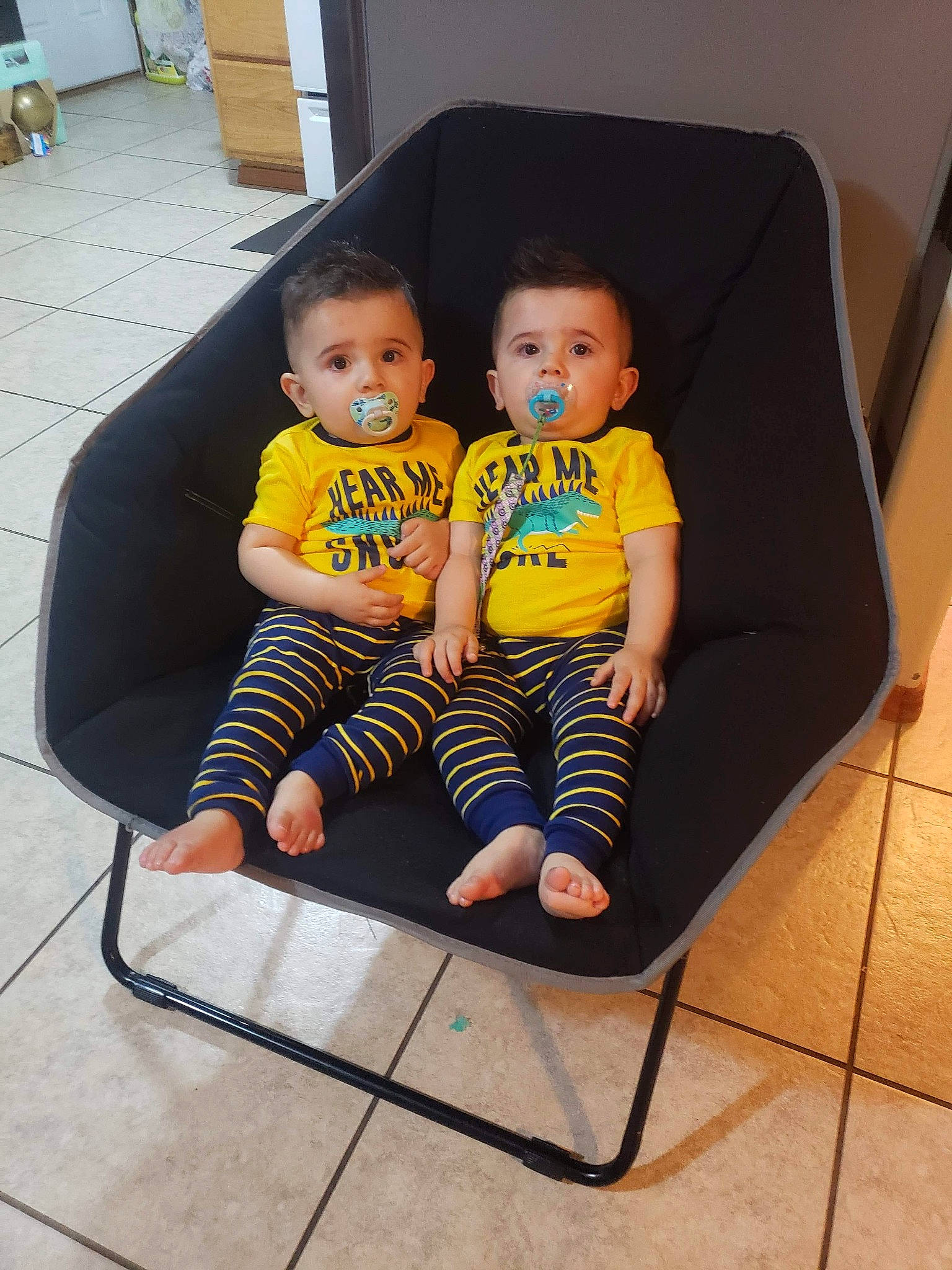 Yusuf And Yasir is registered to the contest to win money with this photo: baby, chair, child, furniture, joy, person, play, product, sitting, skin, toddler, vacation