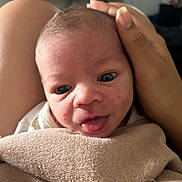 Kenan joined the competition — help win amazing prizes! baby, blanket, care, closeup, comfort, cute, expression, eyes, face, hand, head, holding, human, indoor, infant, newborn, person, skin, soft, tongue