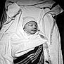 newborn, baby, infant, blanket, striped_blanket, hat, striped_hat, towel, measuring_tape, sleeping, wrapped, hospital, monochrome, black_and_white, portrait, peaceful, bed, soft, child, person
