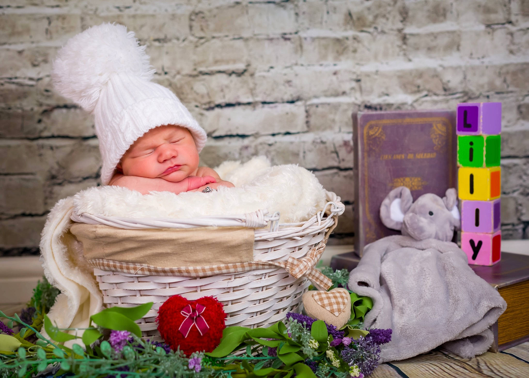 Lilly-rose is registered to the contest to win money with this photo: baby, child, comfort, event, face, fur, grass, happy, hat, headwear, linens, person, petal, photograph, pink, plant, product, room, sitting, textile