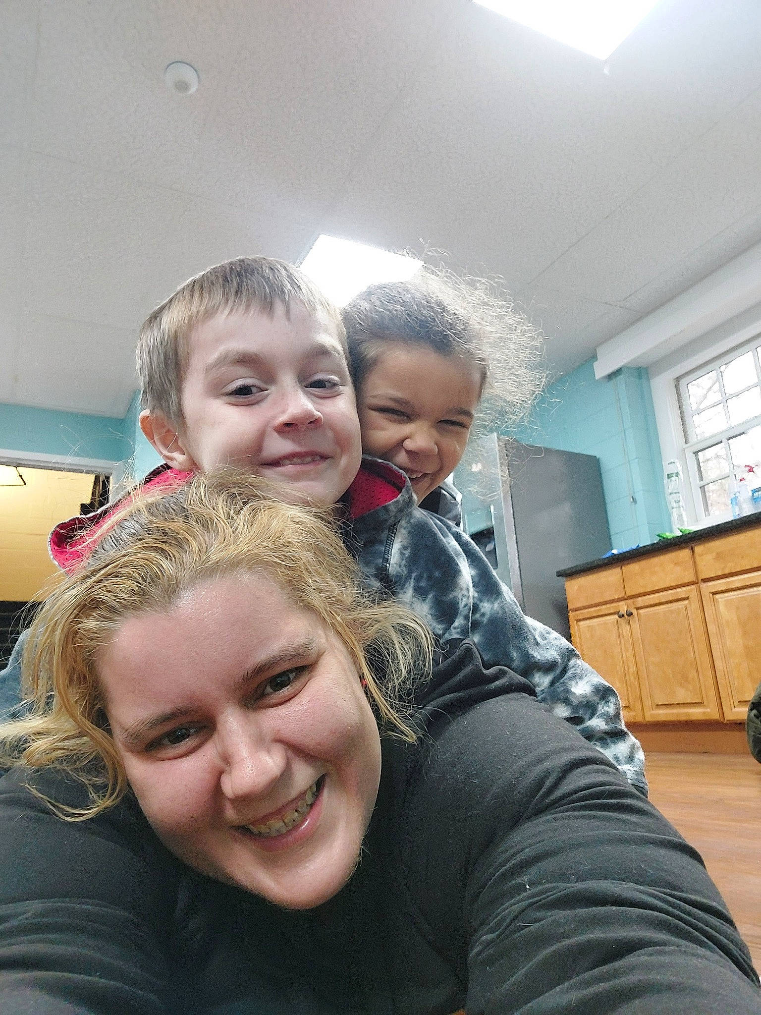 Alyssa is registered to the contest to win money with this photo: blond, child, event, eyebrow, friendship, fun, gesture, happy, houseplant, iris, joy, laugh, leisure, mouth, person, room, selfie, shoulder, sitting, smile