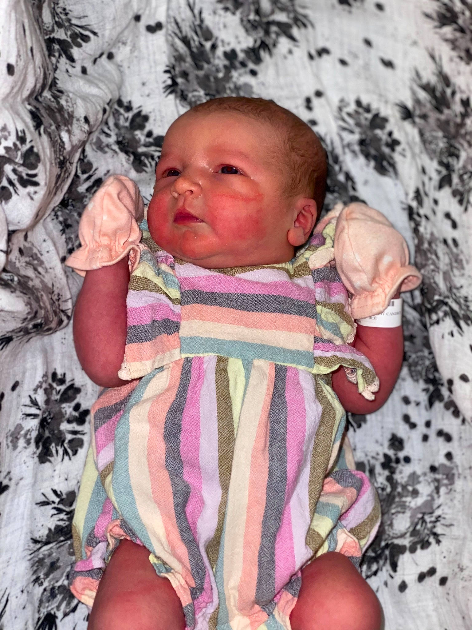 Danikay is registered to the contest to win money with this photo: baby, baby_toddler_clothing, cheek, chin, eye, face, facial_expression, happy, head, human_body, iris, leaf, lip, mouth, nose, person, pink, product, skin, sleeve