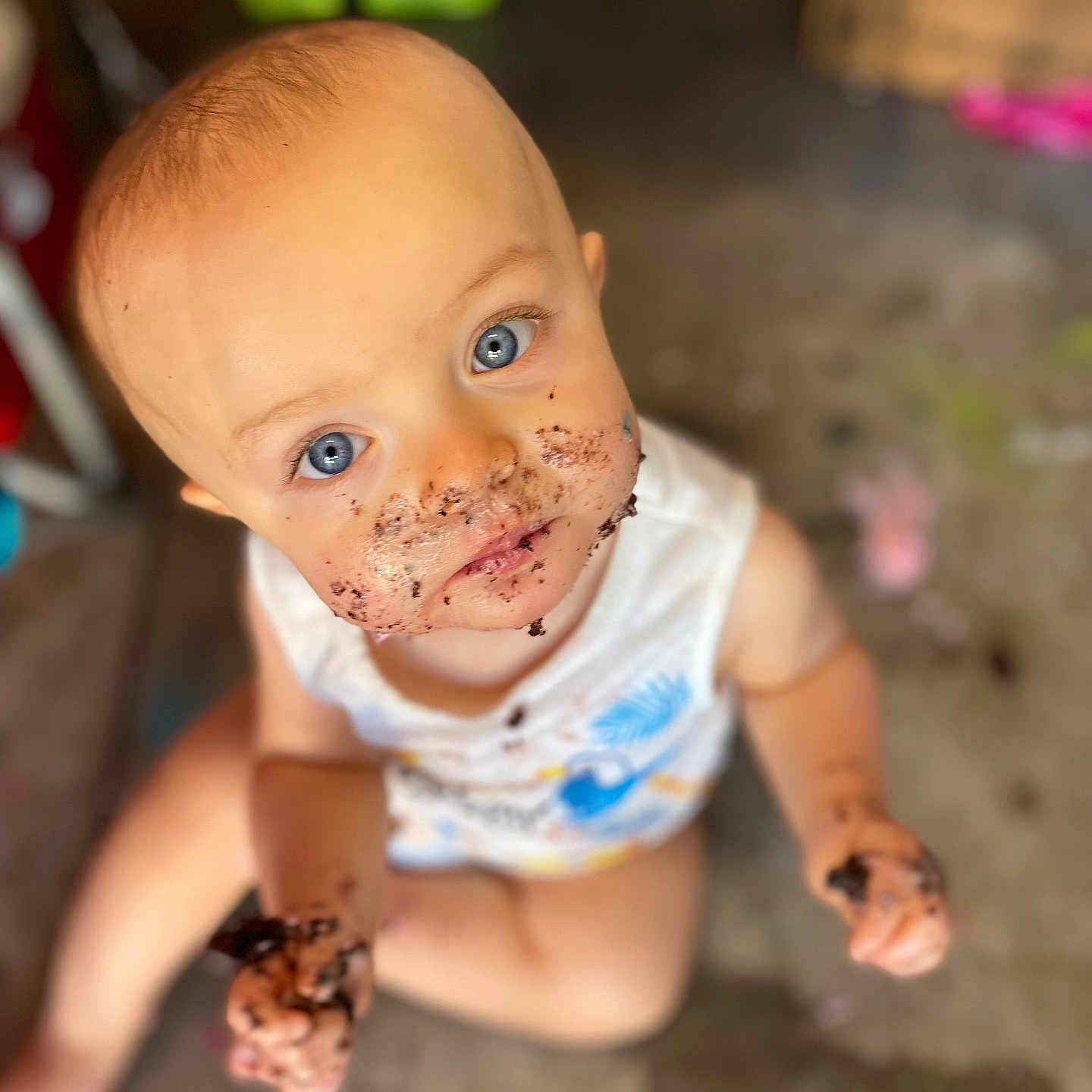 Ricky is registered to the contest to win money with this photo: baby, bodypart, city, cream, cutlery, dessert, eating, face, finger, food, hand, head, icecream, person, photography, portrait, road, sitting, street, urban