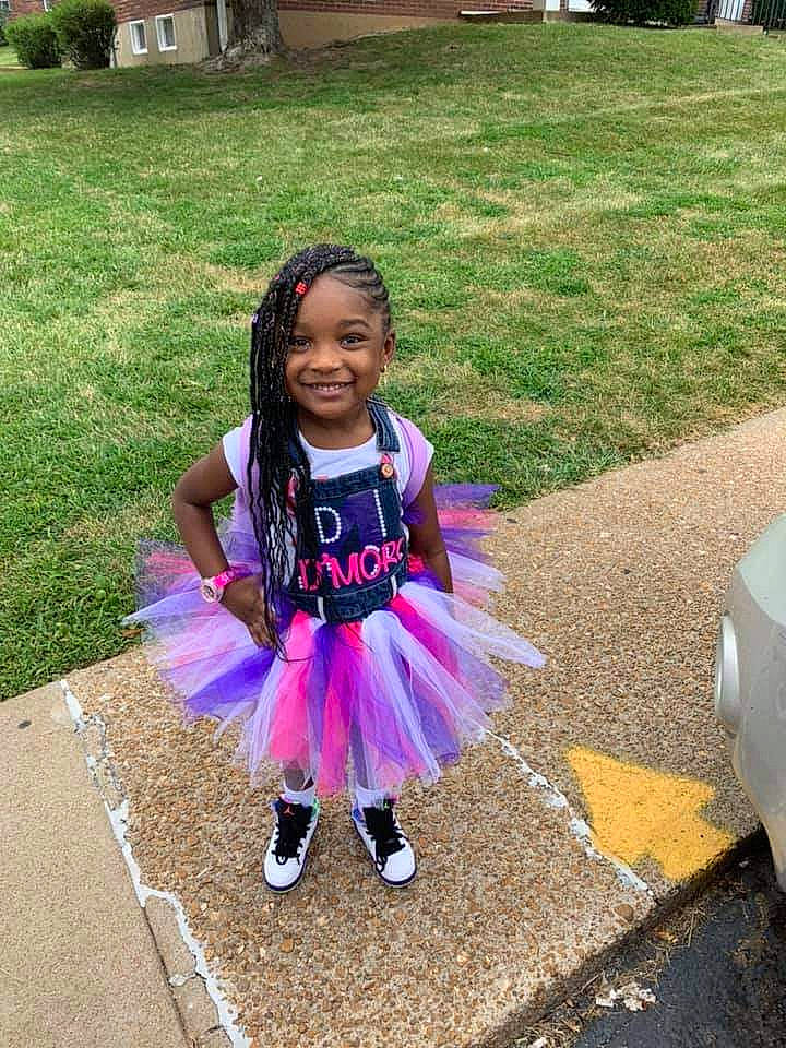 D'Mori is registered to the contest to win money with this photo: child, clothing, costume, dress, grass, joy, person, pink, plant, purple, smile, summer, toddler
