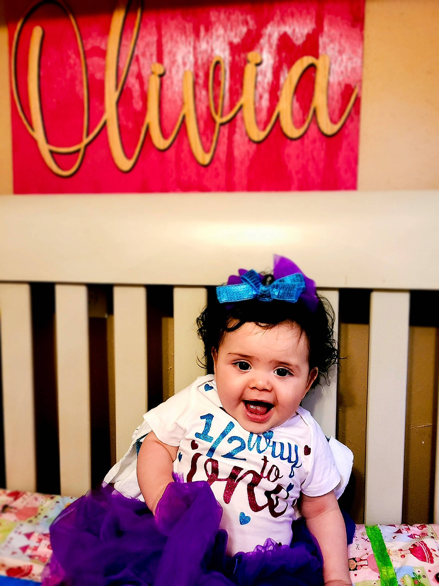 Olivia is registered to the contest to win money with this photo: baby, birthday, child, fashion_accessory, hair_accessory, happy, headgear, magenta, party, person, photography, pink, purple, smile, snapshot, toddler