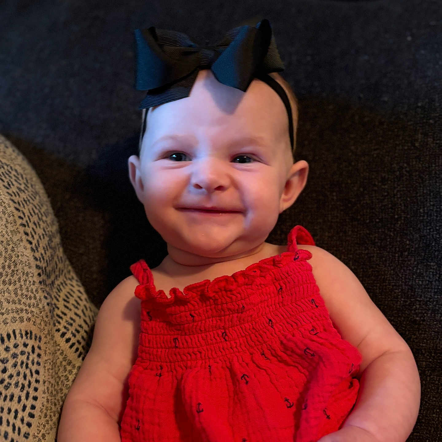 Annalee joined the competition — help win amazing prizes! baby, bodypart, clothing, couch, cushion, dress, face, finger, formalwear, furniture, hand, happy, hat, head, homedecor, knitwear, person, photography, portrait, smile