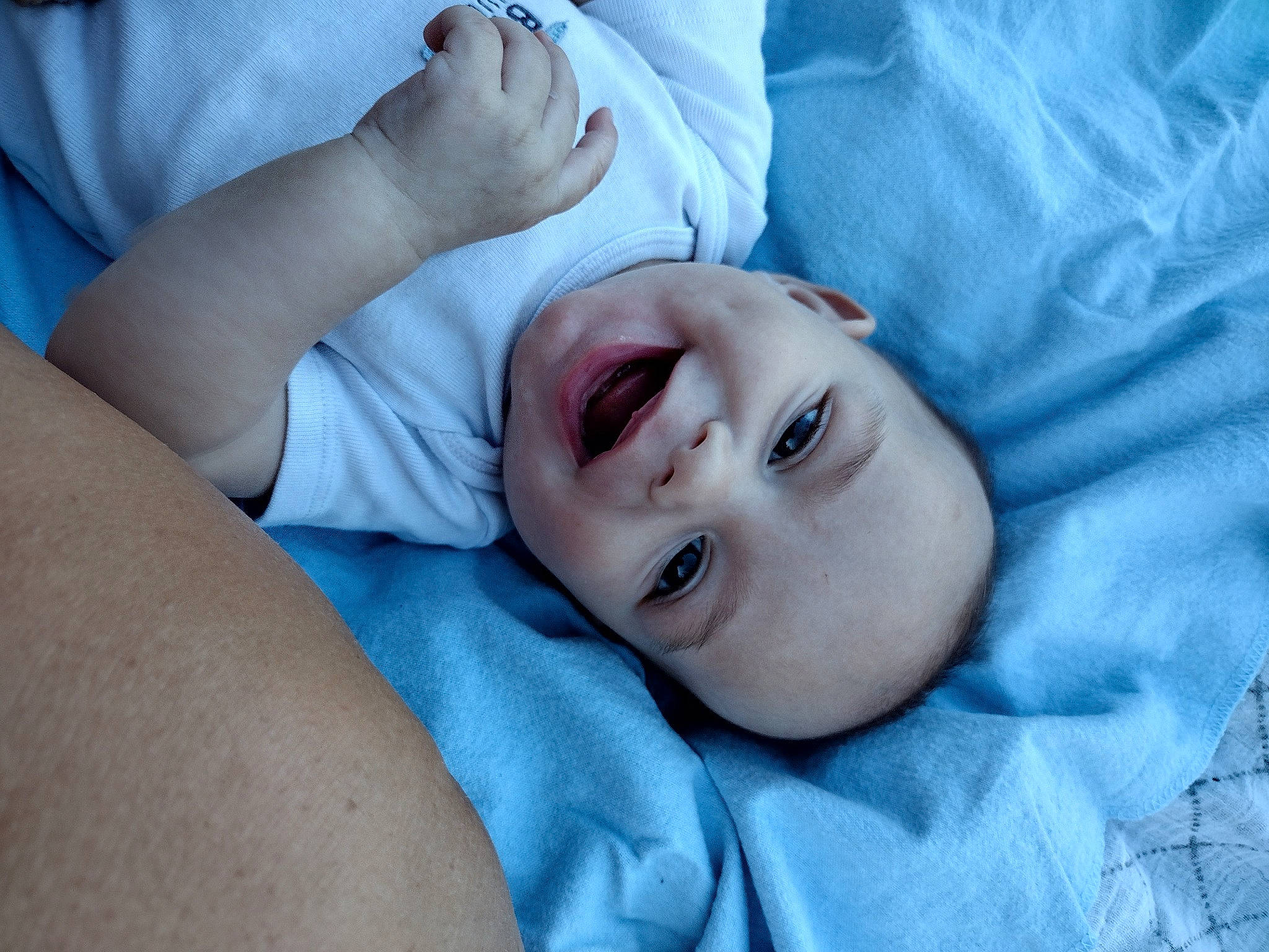 Trace is registered to the contest to win money with this photo: baby, cheek, child, close_up, comfort, eye, eyebrow, eyelash, face, gesture, hat, head, iris, lip, mammal, mouth, nose, person, skin, smile