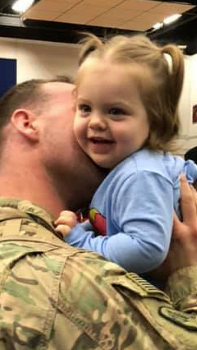 Jolene joined the competition — help win amazing prizes! arm, cheek, child, chin, ear, eye, face, facial_expression, forehead, hairstyle, head, hug, interaction, military, nose, people, person, skin, smile, soldier