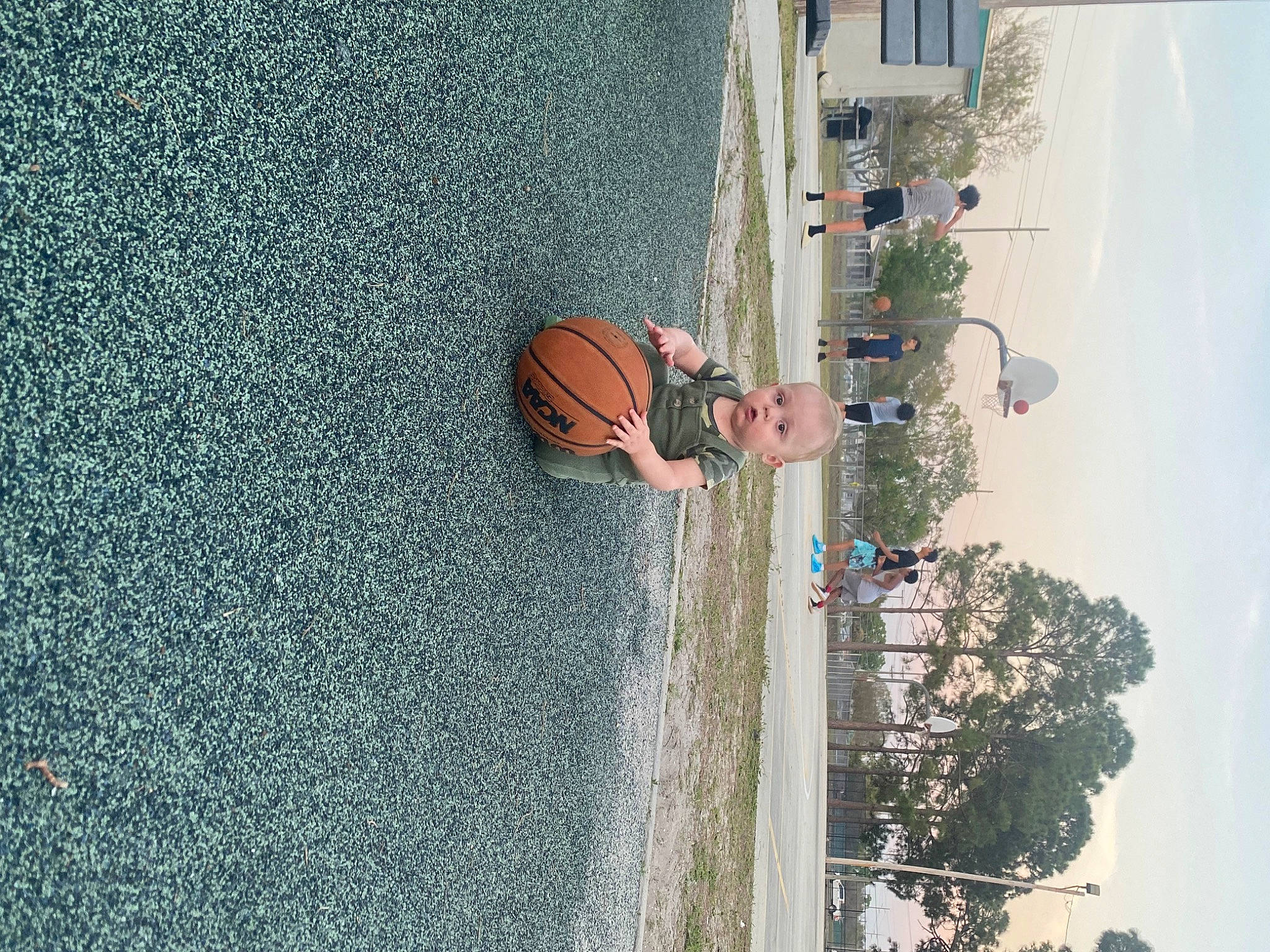 Elio joined the competition — help win amazing prizes! asphalt, azure, ball, concrete, fun, landscape, leisure, line, person, plant, recreation, reflection, sky, sports_equipment, street_light, surprise, tree, urban_design, wall, water