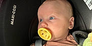 Ludo joined the competition — help win amazing prizes! baby, pacifier, car_seat, maxi_cosi, blanket, blue_eyes, infant, child, seatbelt, clothing, portrait, face, head, closeup, indoors, soft_light, newborn, baby_girl_or_boy, baby_accessory, resting
