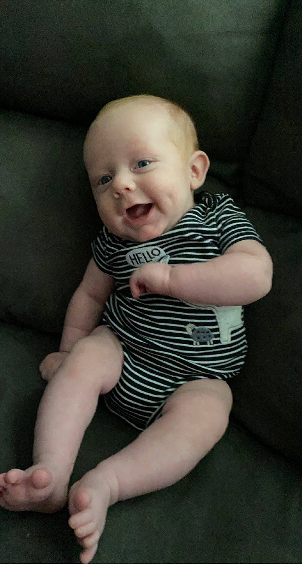 Marshall is registered to the contest to win money with this photo: baby, baby_toddler_clothing, cheek, child, comfort, elbow, face, finger, flash_photography, human_body, human_leg, iris, knee, pattern, person, skin, sleeve, smile, thigh, thumb