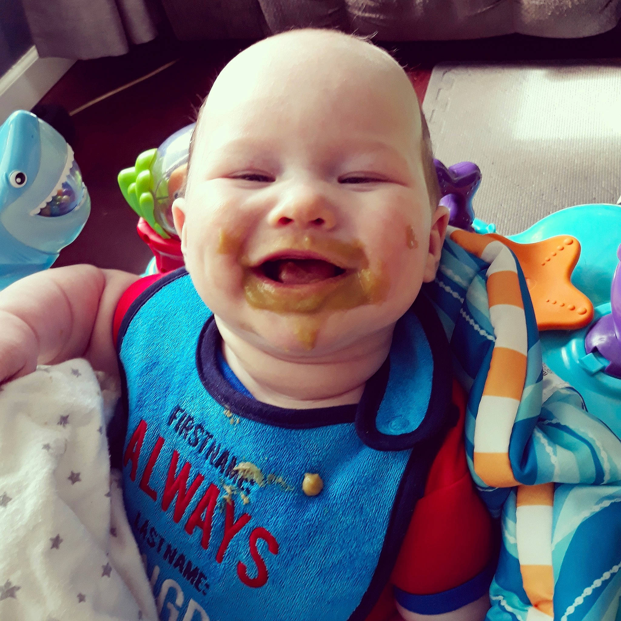 Finnegan is registered to the contest to win money with this photo: baby, baby_making_funny_faces, blue, cheek, child, cool, ear, eye, face, facial_expression, forehead, happy, head, laugh, lip, mouth, nose, person, skin, smile