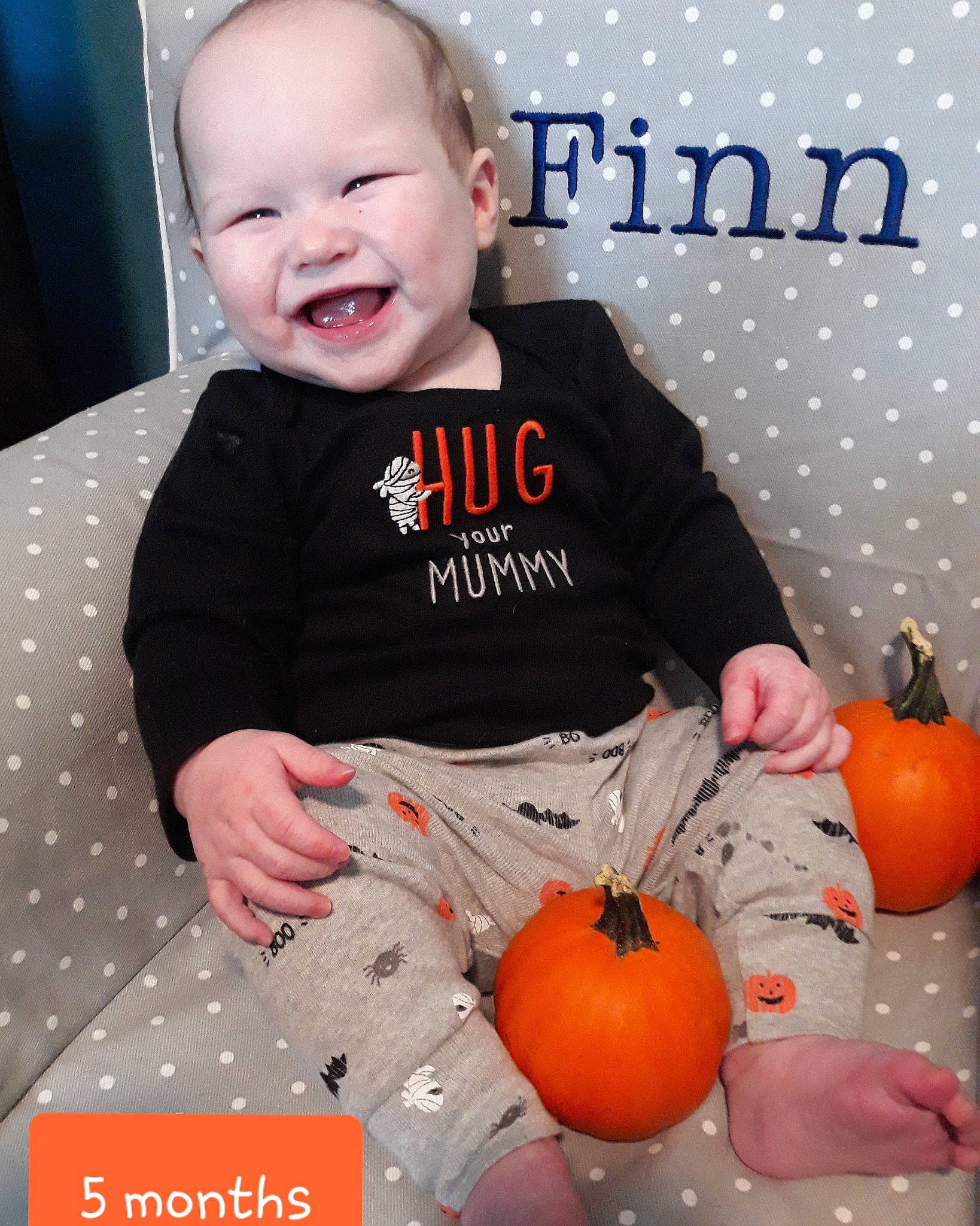 Finnegan joined the competition — help win amazing prizes! baby, baby_toddler_clothing, calabaza, child, food, fruit, orange, pattern, person, photo_caption, plant, pumpkin, toddler, trick_or_treat, vegetable, vegetarian_food, winter_squash