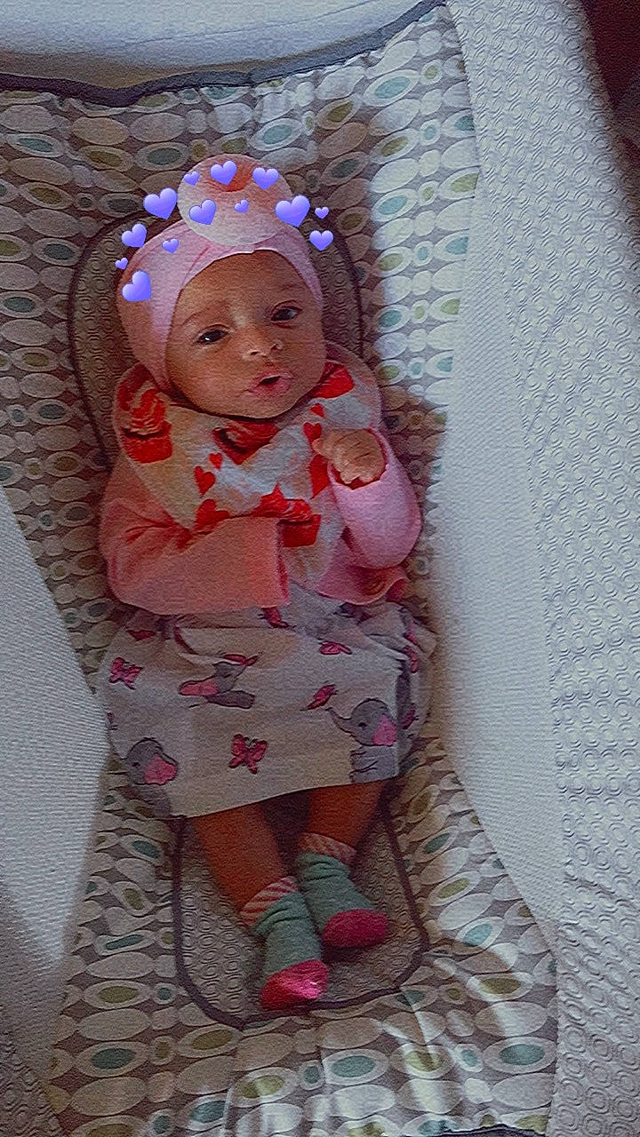 Brooklynn is registered to the contest to win money with this photo: baby, baby_toddler_clothing, child, clothing, dress, face, fashion_accessory, hair_accessory, headband, headgear, headwear, iris, linens, magenta, outerwear, pattern, person, pink, purple, sleeve