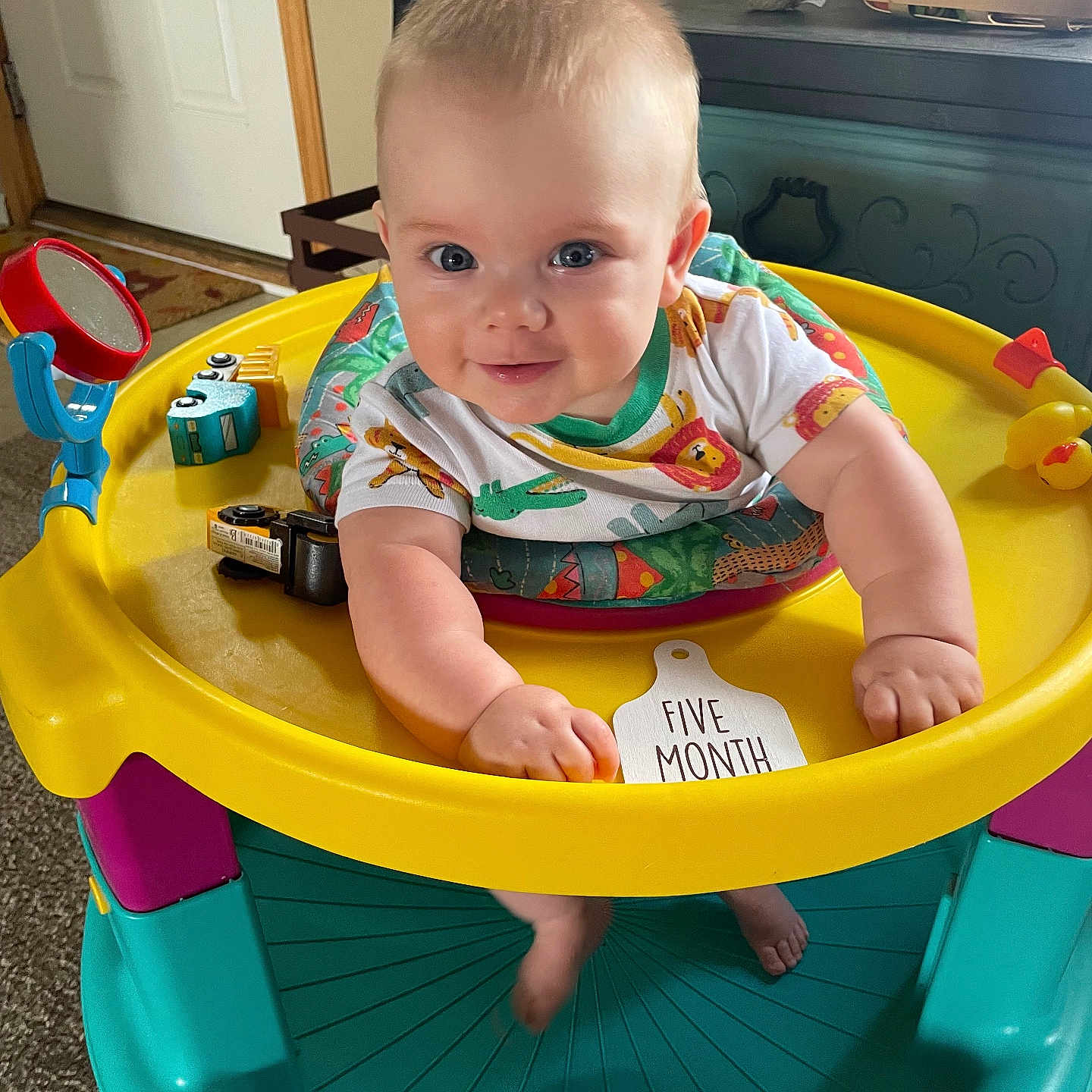 Callahan joined the competition — help win amazing prizes! baby, chair, clothing, cutlery, diningtable, face, furniture, head, indoors, interiordesign, person, photography, playarea, portrait, sitting, spoon, summer, t_shirt, table, toy